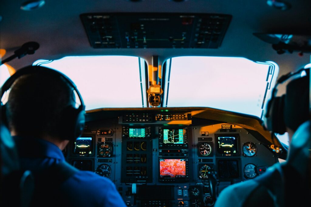 Two pilots in an aircraft cockpit